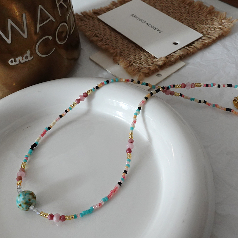 Collar con cuentas de ojo de tigre Maillard Cadena de suéter de otoño e invierno de alta calidad Acero de titanio Cadena de clavícula de piedra natural retro de lujo ligero