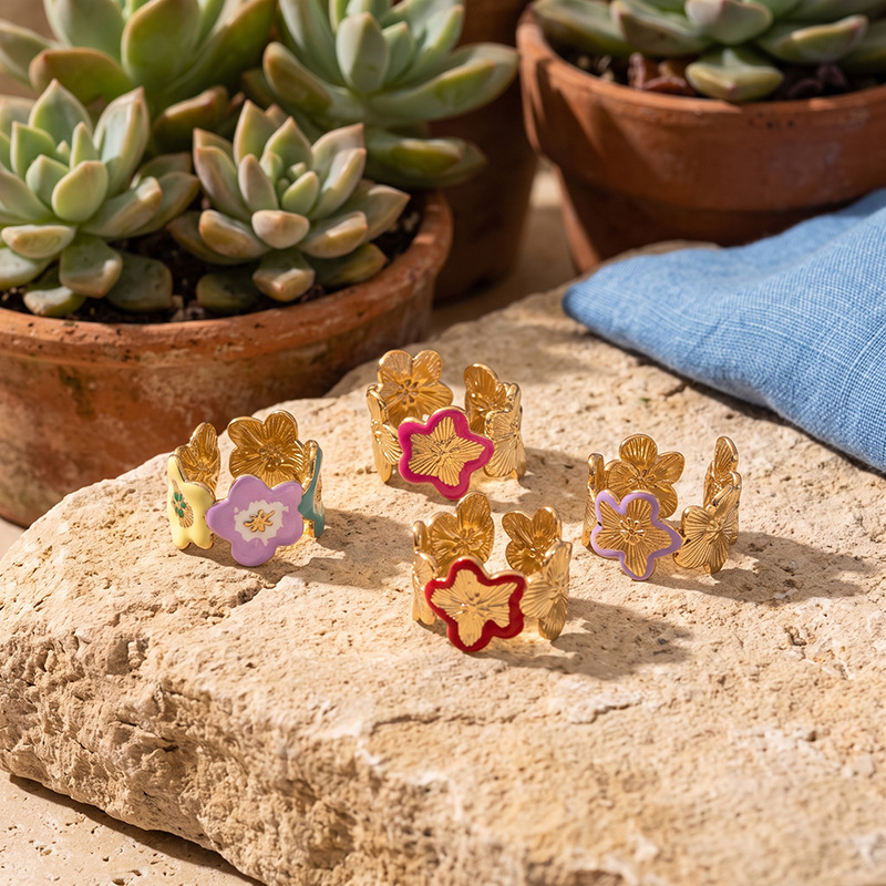 Tina Europa y América transfronterizas de acero inoxidable color flor abierta anillo de moda lujoso ligero diseño personalizado joyas al por mayor