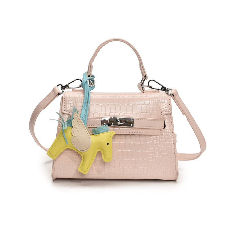 Bolso Kelly de mano de alta gama para mujer 2025 nueva moda casual bolso de hombro con patrón de piedra moda bolso de mensajero de color sólido