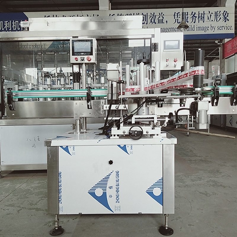 全自动茅台瓶贴标机  茅台瓶双面贴标机  定位槽圆瓶定位贴标机