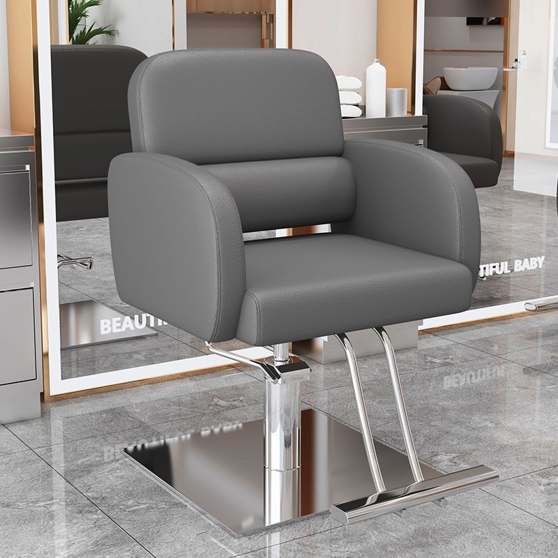 La nueva silla de peluquería simple e innovadora, la silla de peluquería teñida en permanente se puede levantar y levantar, la silla de peluquería giratoria, la silla de corte para el cabello