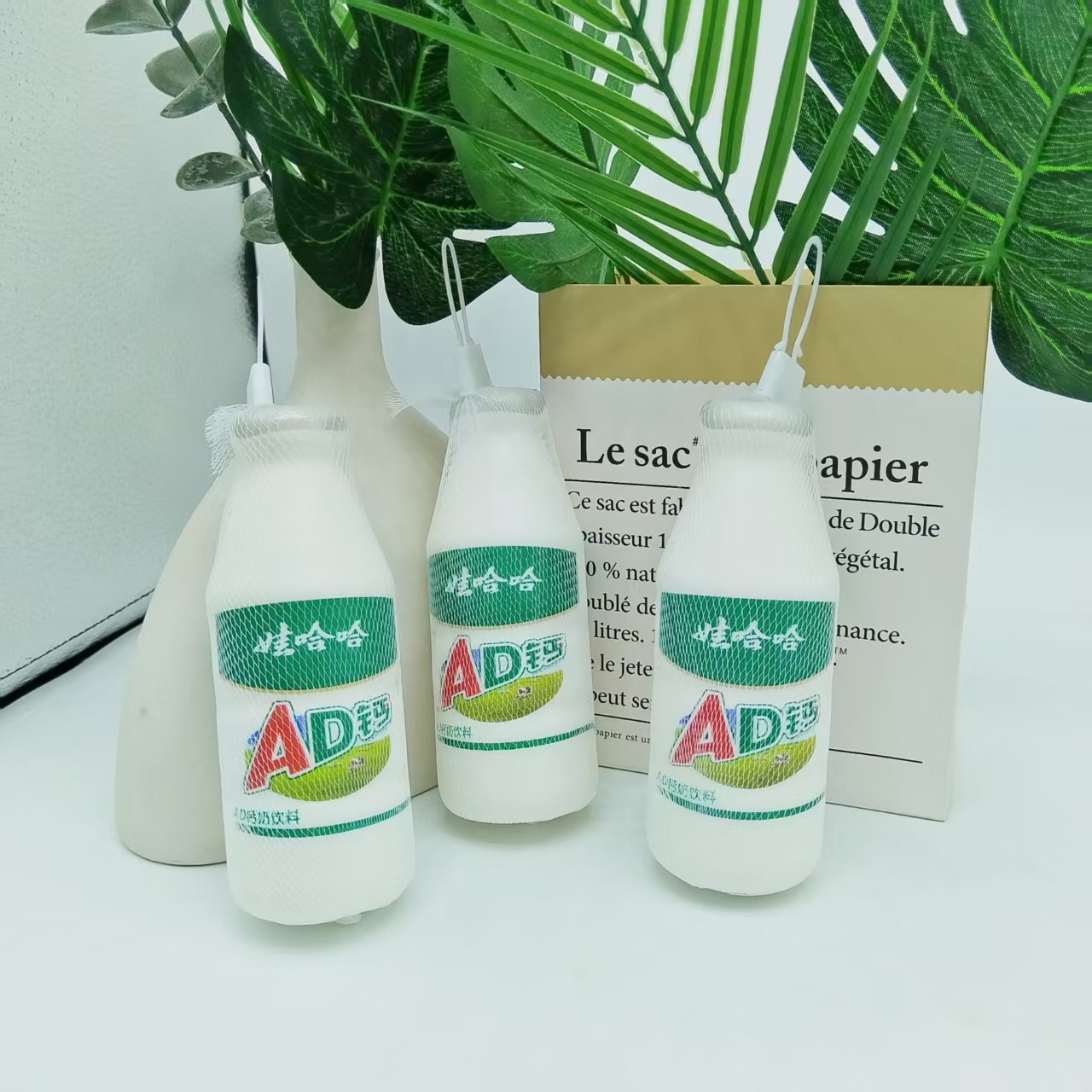 Wahaha ADcalcio pellizcando la botella de música juguete rebote lento descompresión ventilación bebida exprimida suave personalizada para niños