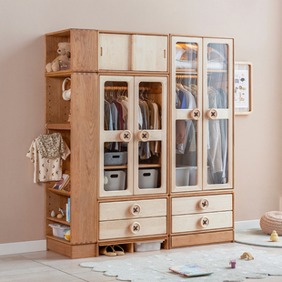 The upper child is showing the growth button wardrobe that can be raised to combine the children's solid wood wardrobe transparent wardrobe.