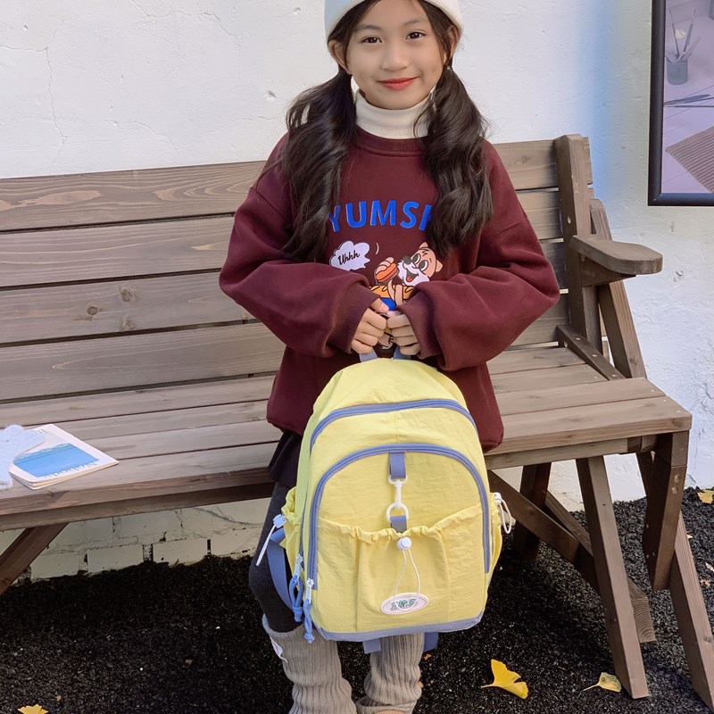 Coreana simple color sólido mochila de niños y niñas de gran capacidad mochila escolar 2026 nueva mochila de niños de cuerda