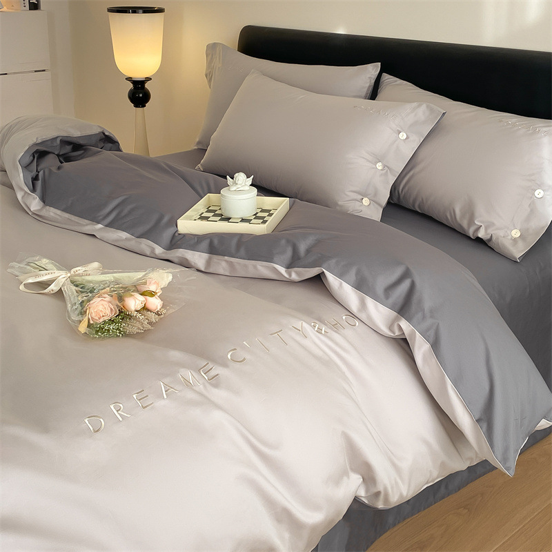 Cama de algodón cuatro piezas estudiantes tres piezas cubierta de edredón bordado de algodón sábanas caseras ropa de cama impresión y teñido activo