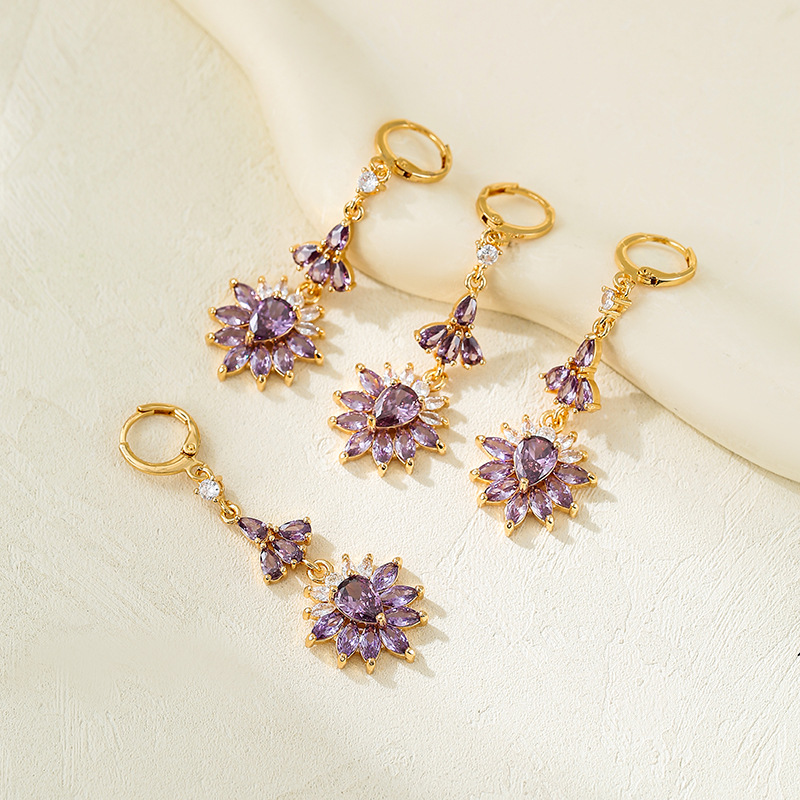 Europa y los Estados Unidos lujoso color zircon auriculares temperamento versátil nicho de diseño de alto nivel flor colgante pendientes para mujeres nuevas
