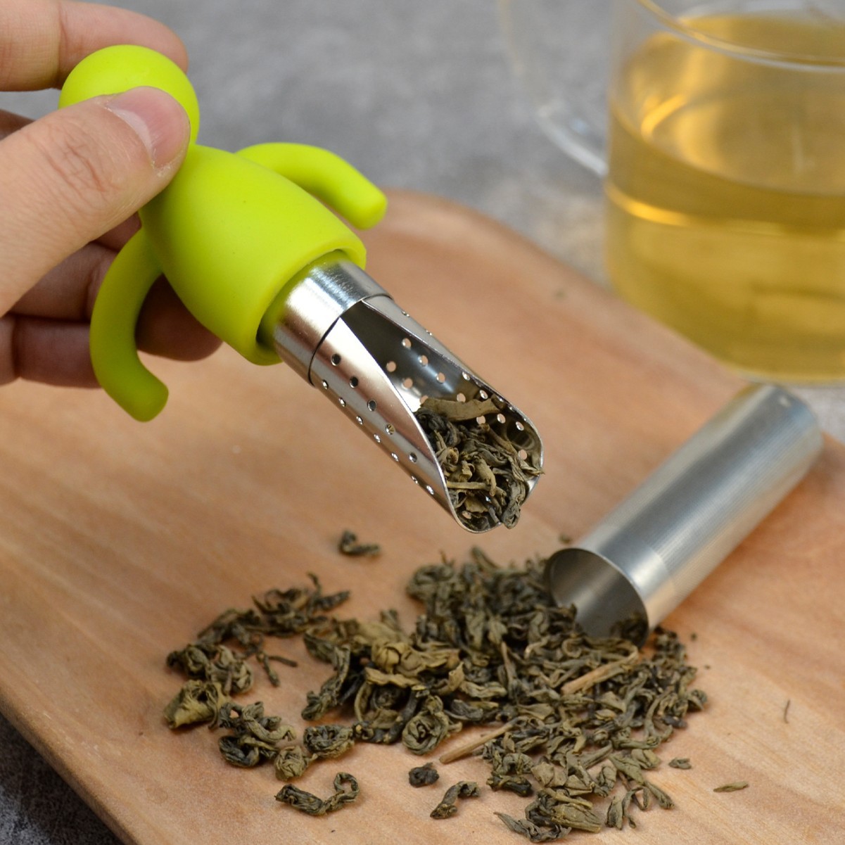 Colador de té creativo de acero inoxidable con cuchara de té colgando portátil de silicona en forma humana fabricante de té al por mayor lindo Filtro de té
