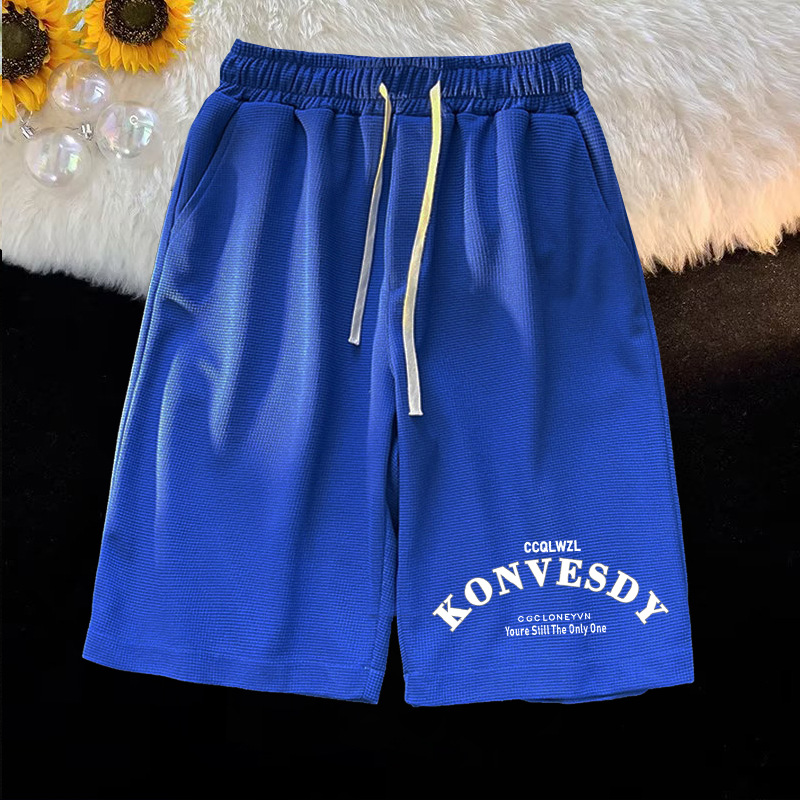 Waffle casual minimalista para hombres, camiseta de manga corta de verano, pantalones cortos para hombres con un conjunto de ropa de moda.