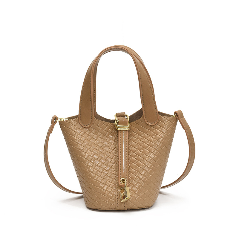 Bolso de cubo portátil con patrón tejido para mujer 2025 nuevo estilo coreano de lujo ligero de alta gama bolso de mensajero para niños de nicho