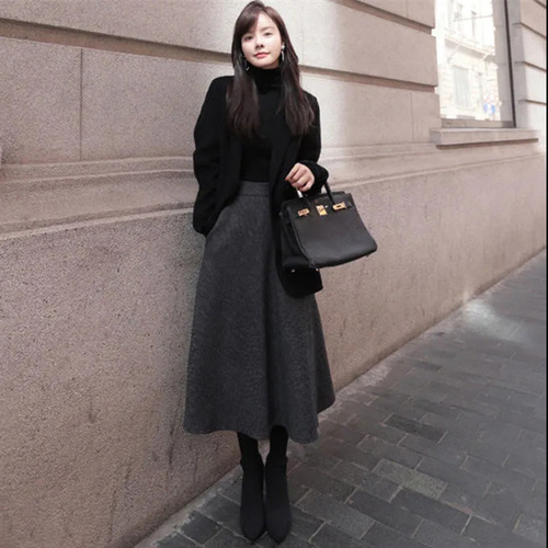 Winter thickened woolen skirt that covers the buttocks and looks slimming, herringbone pattern A-line skirt with large hem, versatile mid-length skirt wholesale