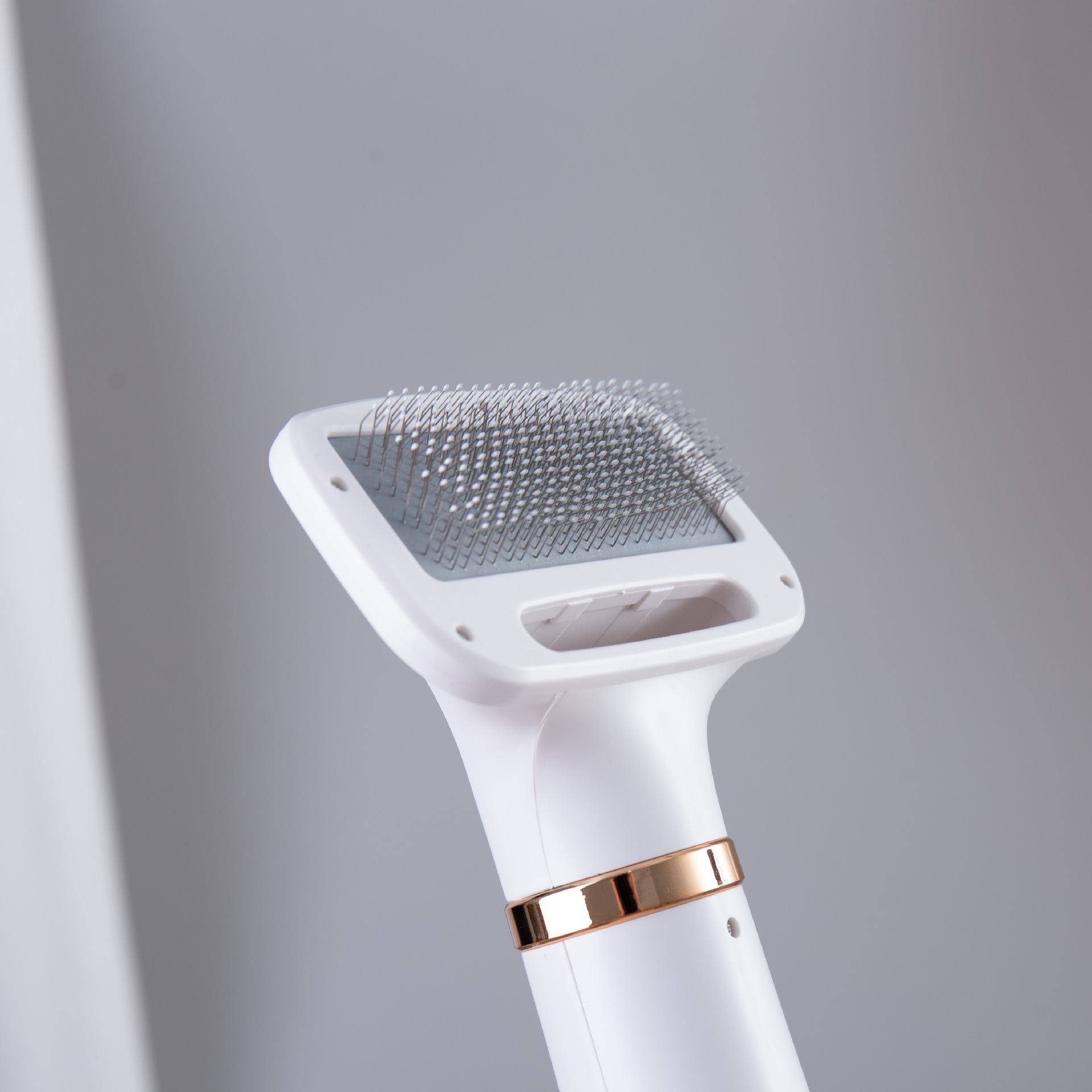 Secador de pelo para mascotas transfronterizo dos en uno secador de pelo para perros y gatos limpieza eléctrica aseo peine para mascotas peine de aire caliente al por mayor