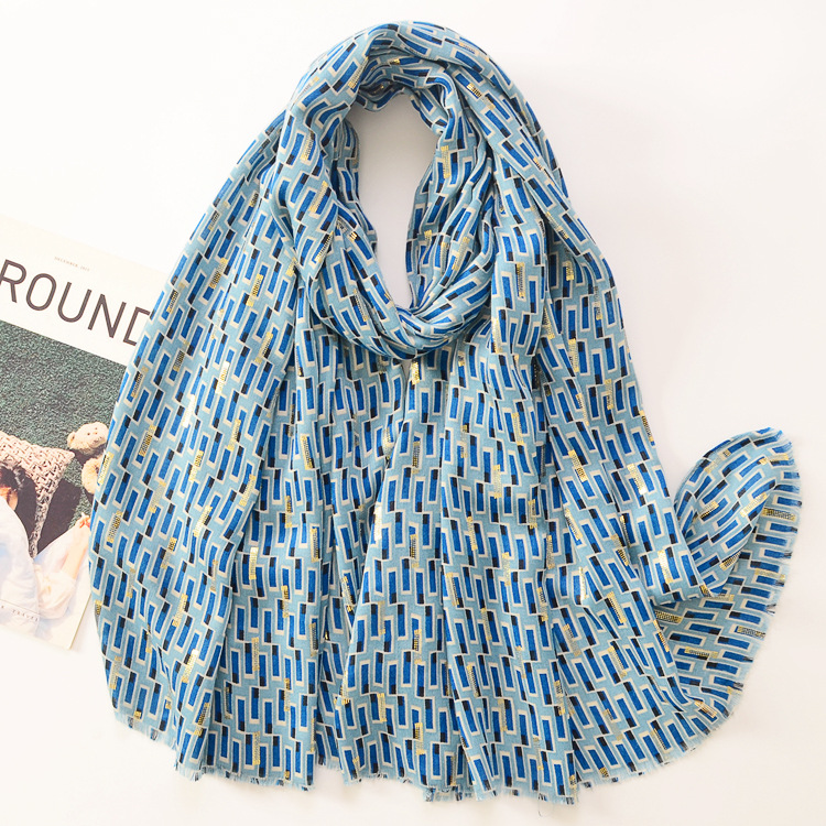 Exportación de comercio exterior suave satén algodón moda chal bronceado geométrico algodón y lino sensación bufanda de seda viajes protección solar bufanda caliente