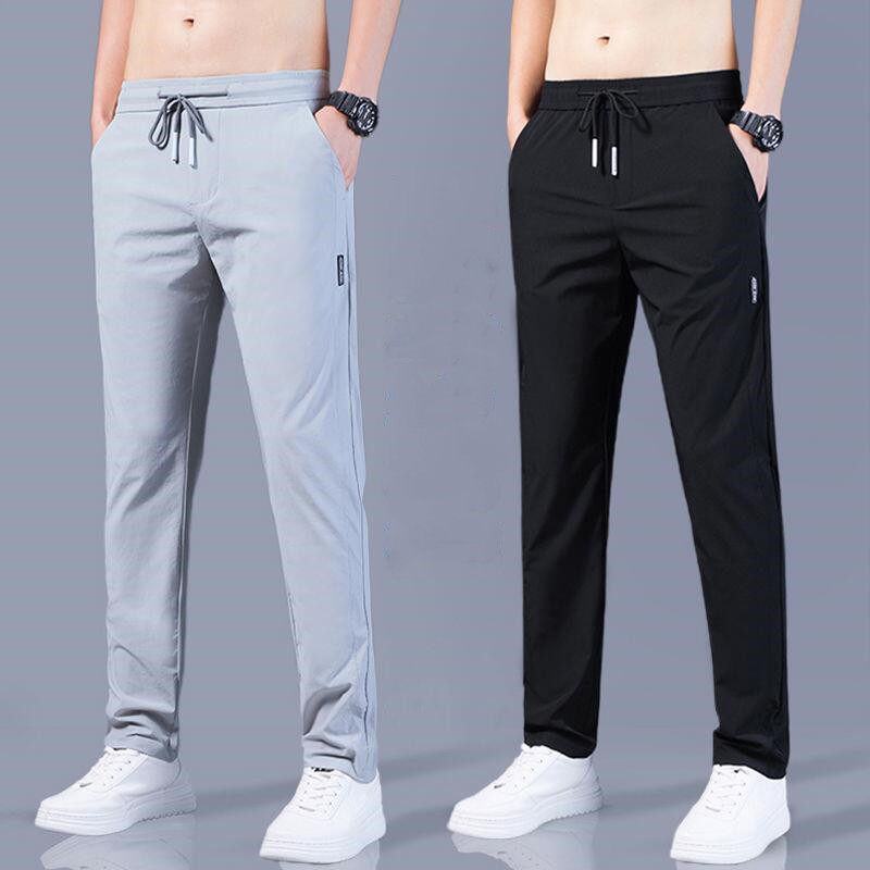 Pantalones casuales de los hombres rectos slim fit verano fino elástico cinturón elástico pantalones sueltos más tamaño entrega de una sola pieza