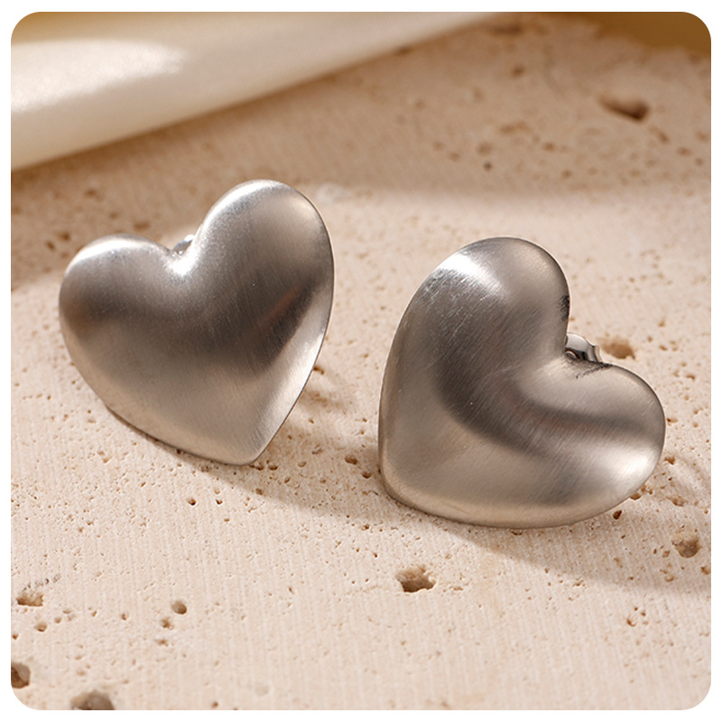 Taina Omeiins amor de moda alta sensación de textura bicolor pendientes de acero inoxidable 18k oro titanio pendientes de acero para mujeres