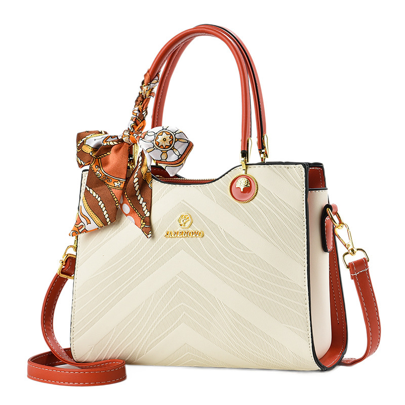 Bolsas de mujer transfronterizas 2025 nueva moda relieve bolsas de mano de gran capacidad bolsas de madres de mediana edad bolsas de hombro mochila