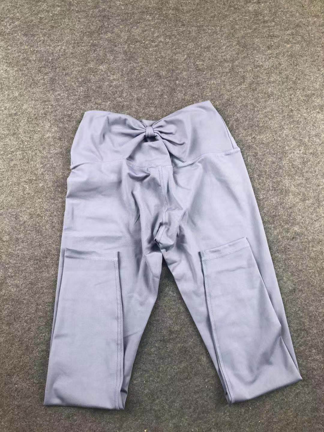 pantalones de yoga deportivos ajustados elásticos de secado rápido NSLX21169