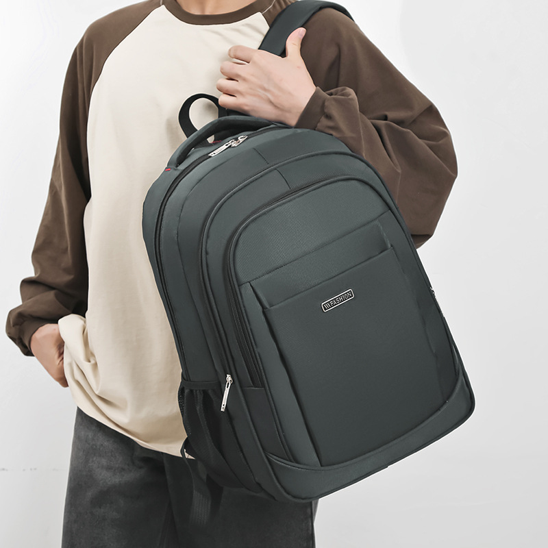 Mochila de hombre al por mayor nueva mochila de computadora de negocios simple de gran capacidad, mochila de viaje de viaje de ocio