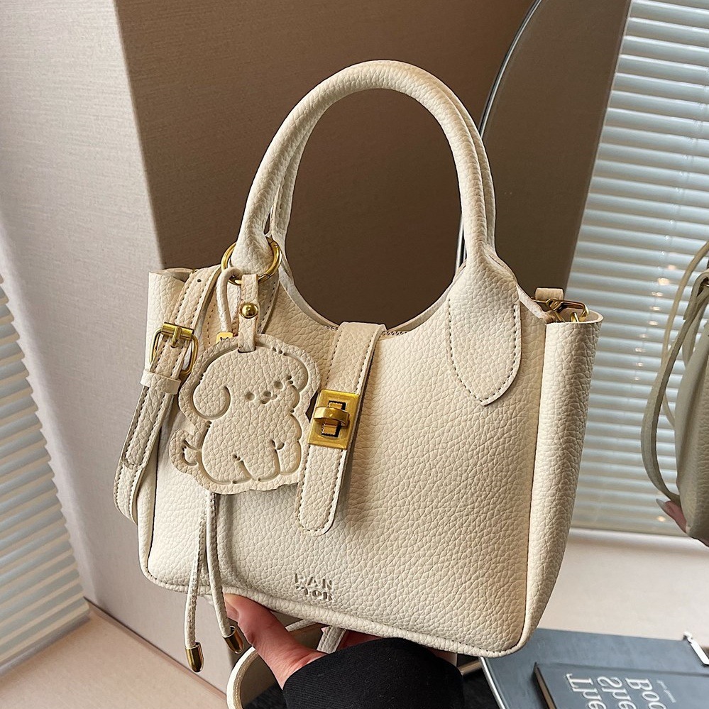 Bolso de alta sensación para mujeres 2025 nuevo lichi de moda canasta de verduras bolso de mano bolso de hombro