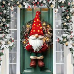 国境を越えた新型アマゾンサンタクロースがクリスマスシーンのカーテンを飾っている