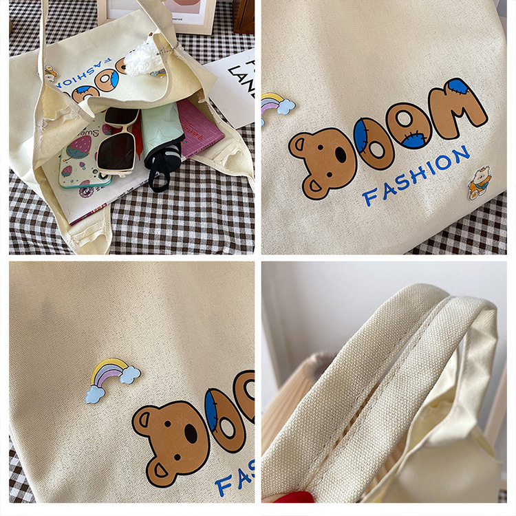 2021 Summer Japanese-style simple canvas bag, student backpack, single-shoulder handbag for going out, cartoon badge cotton bag undefined