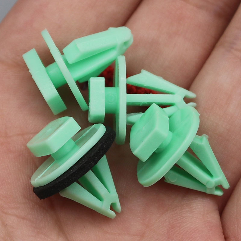 Piezas de automóviles al por mayor puerta guardia panel plástico nylon rueda ceja hebilla D477 OE:11569920