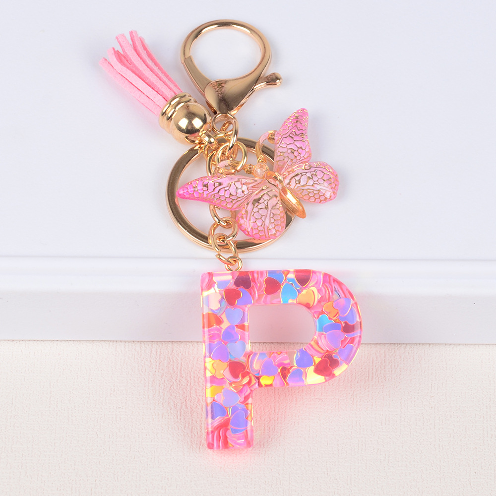 Explosiones transfronterizas amor sequillas iniciales llavero al por mayor resina letra mariposa fringe llavero se puede personalizar