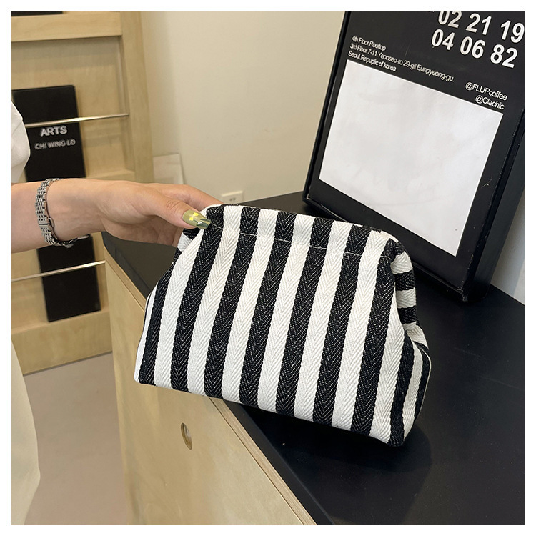 New cross-border fashion color-blocking striped cosmetic bag, women's loose change mobile phone storage bag, trendy and niche cloud clutch undefined
