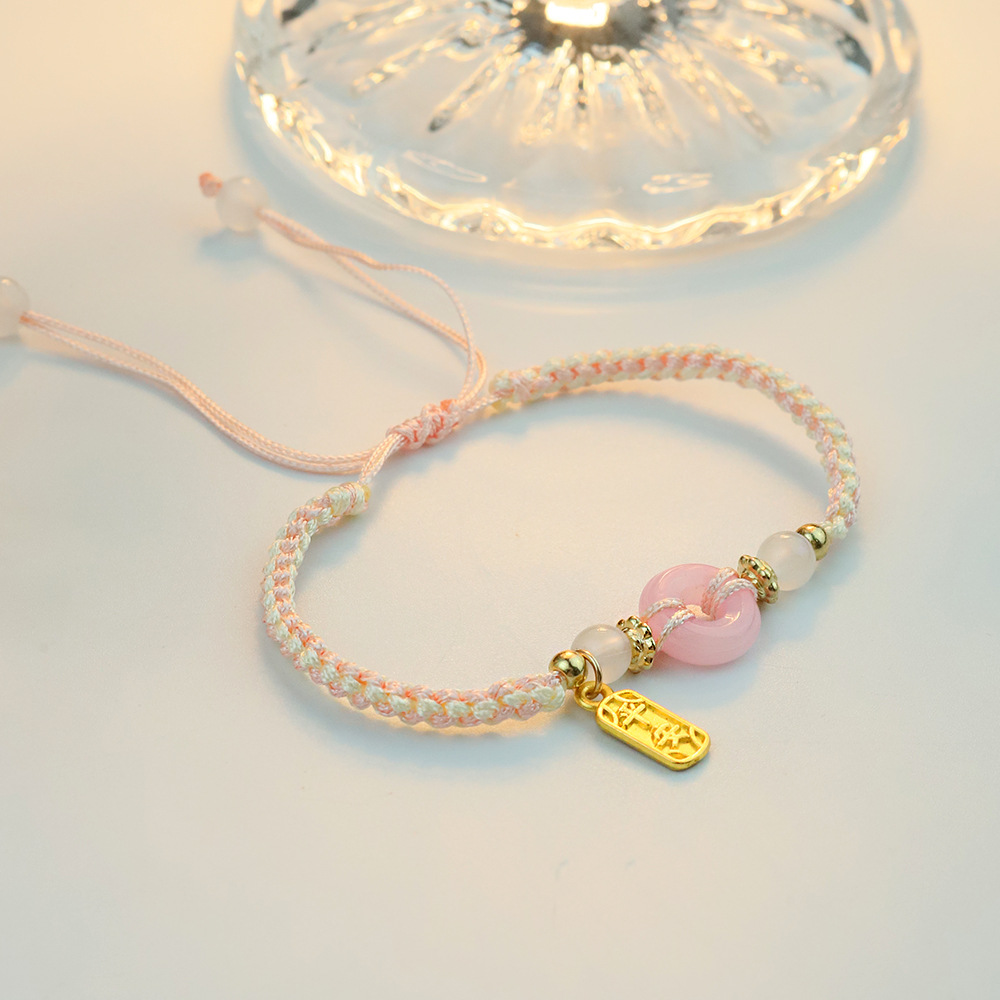 2025 nuevo amigas joyería de mano de melocotón de seguridad pulsera de pareja mujer ligera de lujo nicho tejido de mano