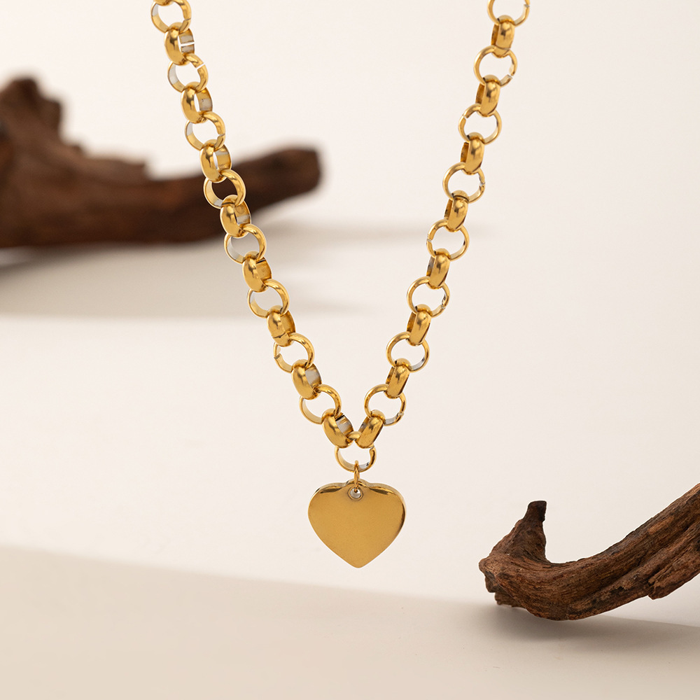 [collar de acero de titanio dorado + acero] collar de amor de nicho con cadena de clavícula avanzada en la moda de lujo ligero femenino
