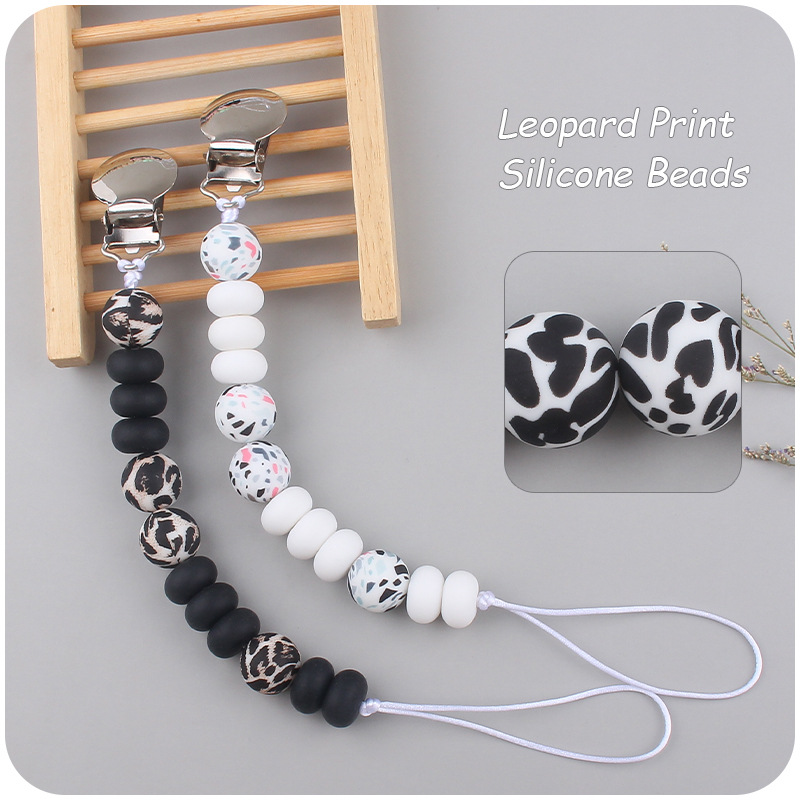 Nuevo bebé suministros de hierro redondo chupete clip creativo bebé calmante leopardo cuentas de silicona mordedor chupete cadena anti-gota cadena
