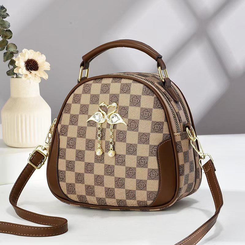 Bolsa de hombro simple bolsa clásica bolsa Taizhou bolsas de comercio exterior transfronterizas bolsas de mano retrógradas bolsas de ajedrez