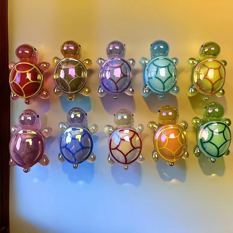 Galvanoplastia de color luminoso tortuga celebridad de la red tortuga bolsa ciega resina accesorios de dibujos animados resina bricolaje decoración de coche péndulo X20