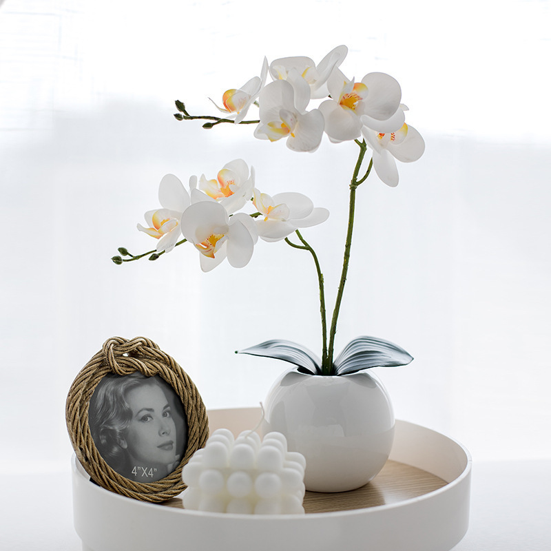 Nuevo jarrón de cerámica china orquídea mariposa conjunto de decoración del hogar flores falsas flores simuladas de alto nivel de decoración floral realista