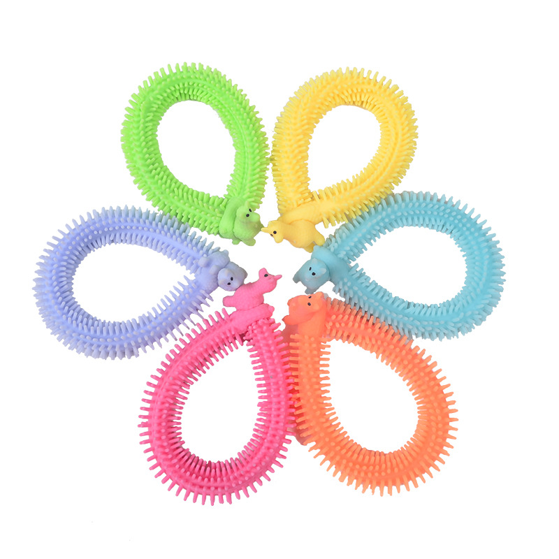 Amazon Venta caliente creativo nuevo dinosaurio Lala descompresión ventilación cuerda dibujos animados alpaca pulsera pull fideos