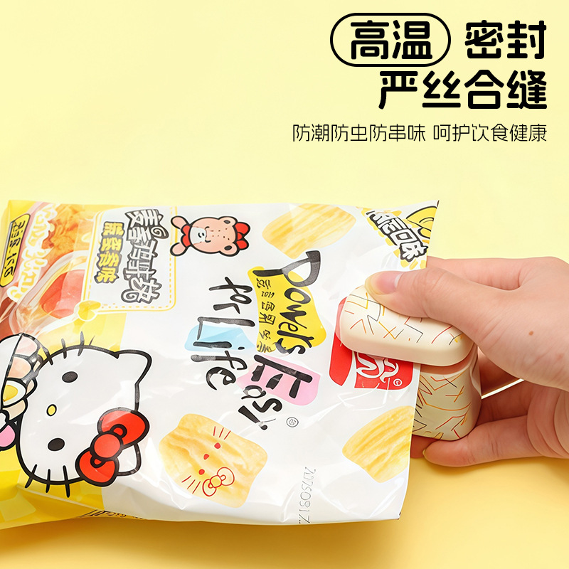 Mini máquina de sellado de mano tipo absorción magnética portátil bocadillos bolsas de plástico de vacío de plástico de alimentos frescos máquina de sellado a prueba de humedad
