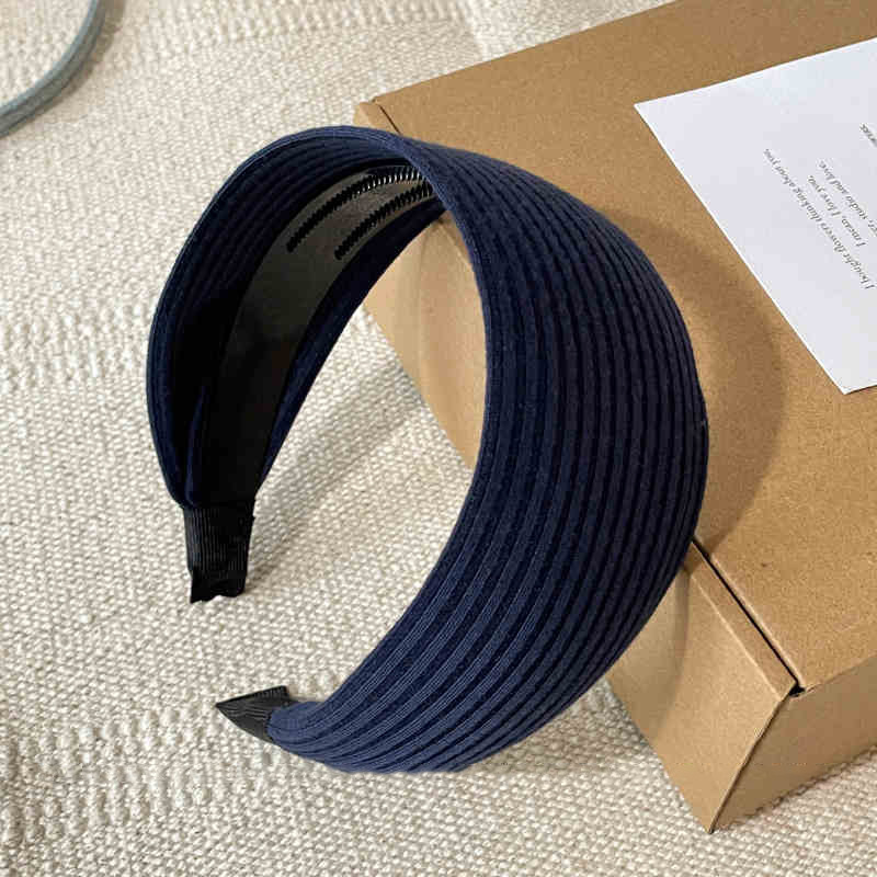 Otoño y invierno de alta sensibilidad para el cabello de mujeres cráneo alto borde amplio agujero de punto de banda de cabeza muestra cara pequeña gris ensanchada banda de cabello