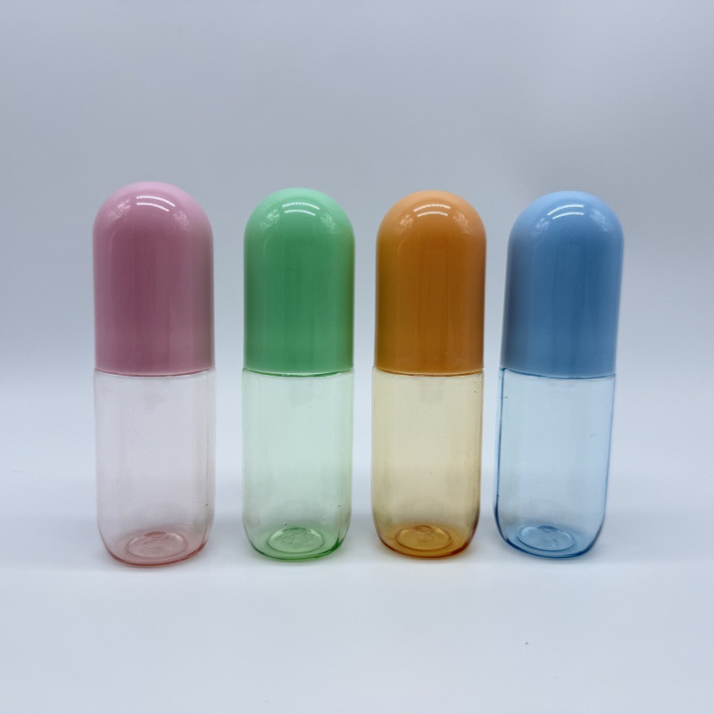 厂家直供60mlPET透明胶囊形瓶塑料旋盖包装空瓶子可带喷头