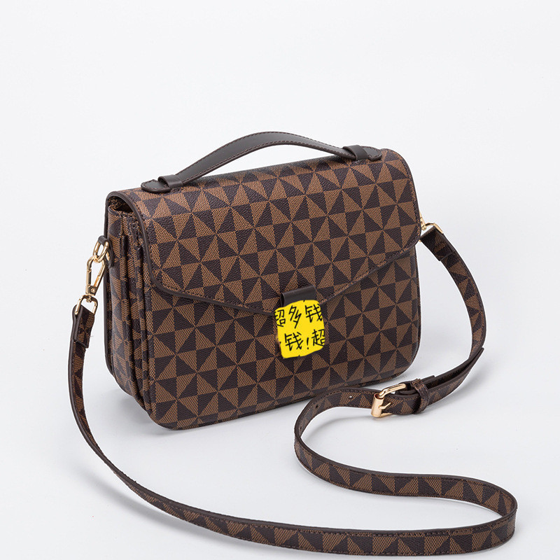 El mismo bolso de mujer 2024, la nueva versión coreana de la moda, con hebillas oblicuas, bolsos cuadrados pequeños, bolsos estampados retro