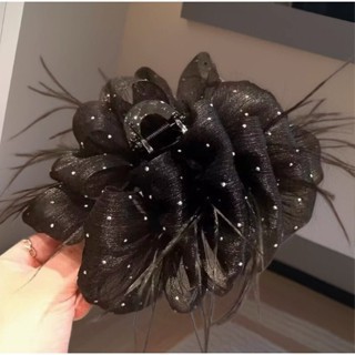 Black feather crushed diamond bubble clip