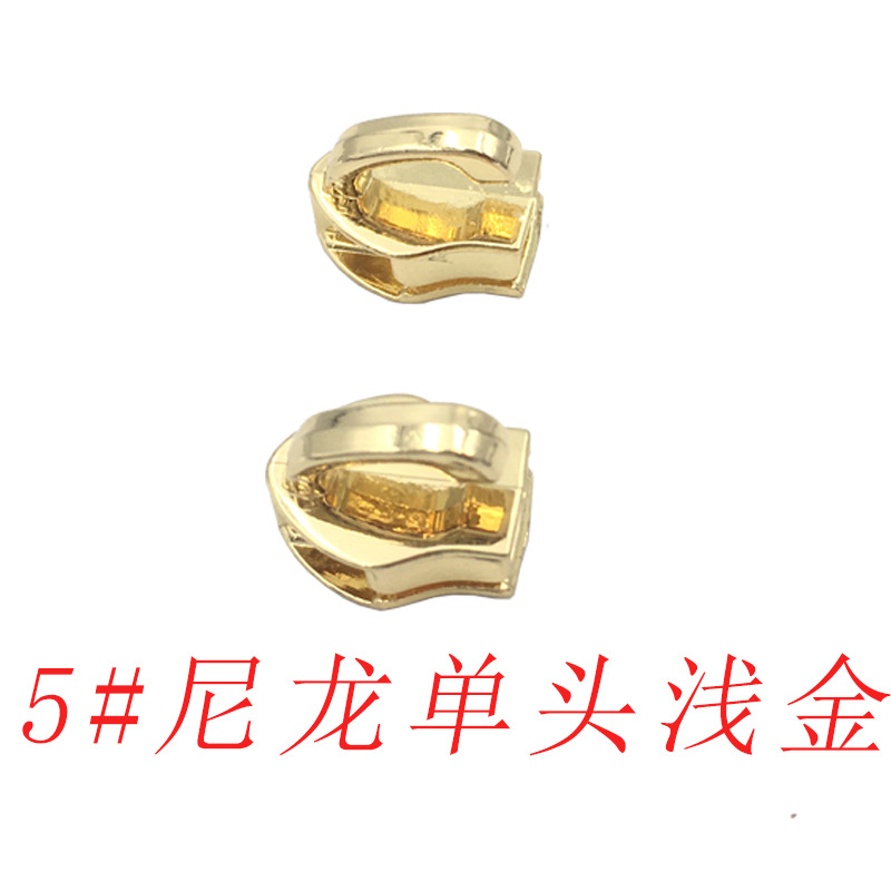 En stock al por mayor N ° 3 N ° 5 N ° 10 dientes de goma de nylon elefante nariz de una sola cabeza equipaje cabeza colgante chapado rodillo chapado multi-color