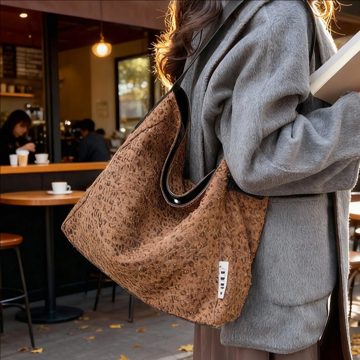 Retro leopardo bolso tote mujer 2025 nuevo nicho leopardo bolso sucio gran capacidad bolso de cubo de hombro casual
