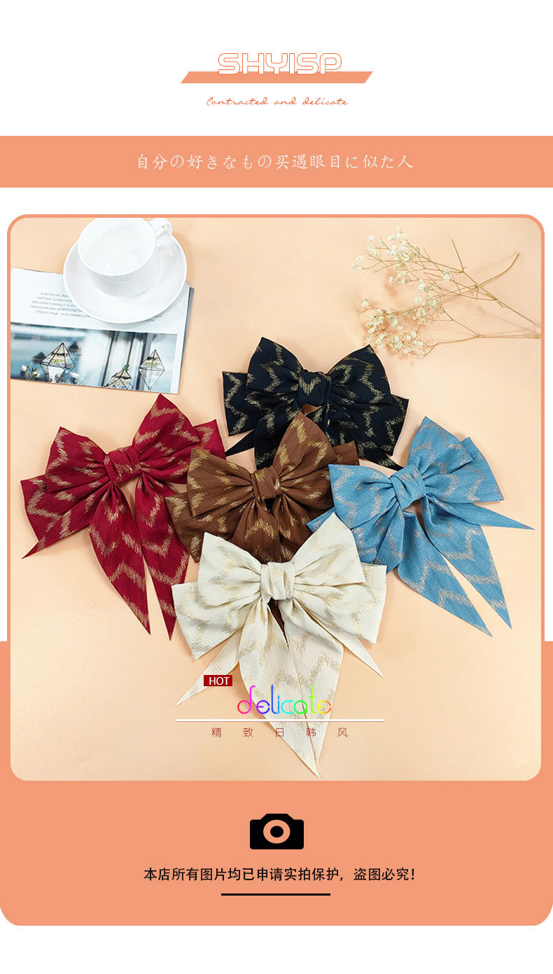 Korean New Bronzing Bow Hairpin Fabric Personality Hair Clip display picture 1