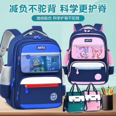 新しい小学生のカバンの卸売りの子供はリュックサックの一二三四から六年生の男子学生の大容量を減らします。