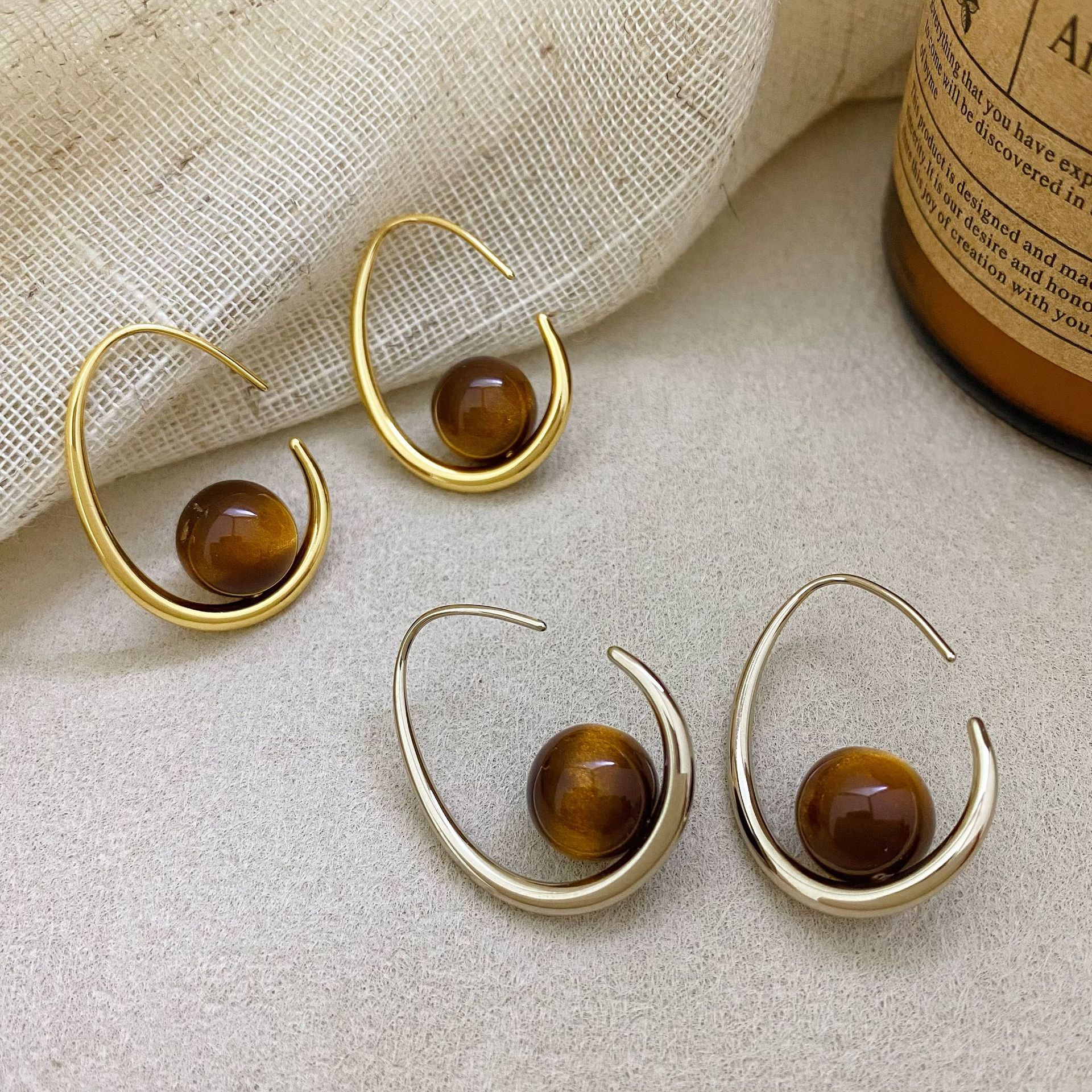 Copper-plated real gold French vintage imitation tiger eye stone drop-shaped hoop earrings for women, new light luxury niche earrings