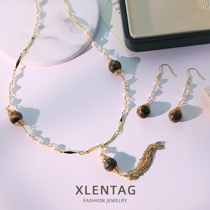 Perla natural ojo de tigre oreja gancho pendientes collar conjunto retro alta sensación pendientes temperamento joyas al por mayor