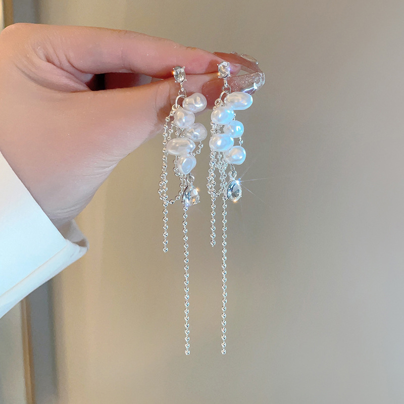 Pendientes de borla largos de circonio de nuevo estilo europeo y americano Pendientes de sentido de alta calidad Pendientes de gota de perlas de alto brillo de pétalos