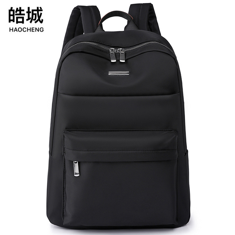 Comercio exterior al por mayor 2023 nueva mochila casual para mujer de nailon mochila simple y versátil de gran capacidad para computadora de 14 pulgadas