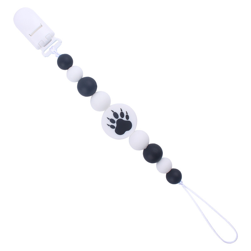 Nuevo bebé suministros de dibujos animados de impresión redonda amor creativo DIY silicona mordedura molar pezón cadena anti-caída