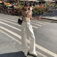 レトロなハイウエストのゆったりしたワイドパンツを郵送します。