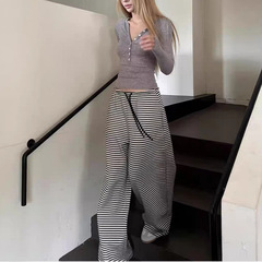アーチ形の狭い腰のバナナのテーパードパンツの女性2024秋のタイプのギャルの怠惰な風のゆったりとしたカジュアルなひものストレートパンツ